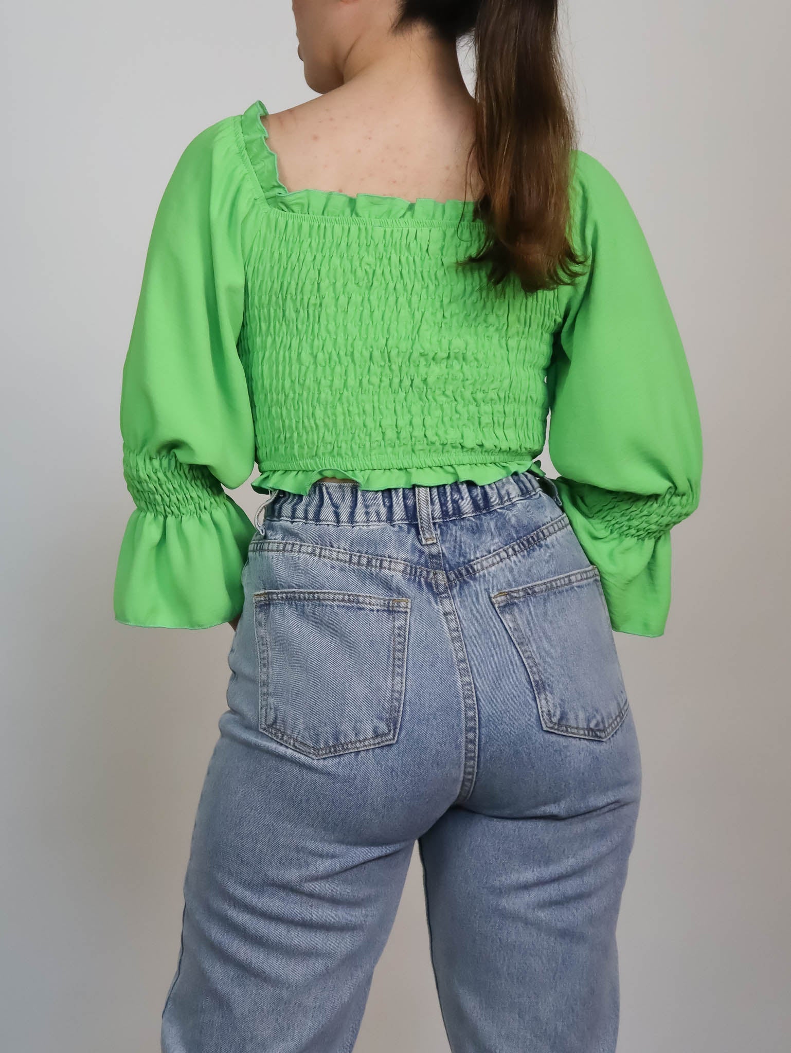 Top verde elastico off shoulder