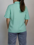 Blusa menta plisada